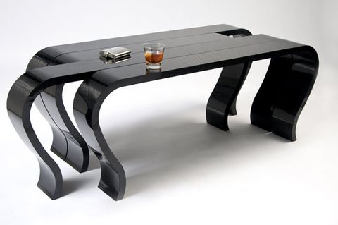 Exploring the Unique Appeal of Metal-Base Carbon Fiber Tables